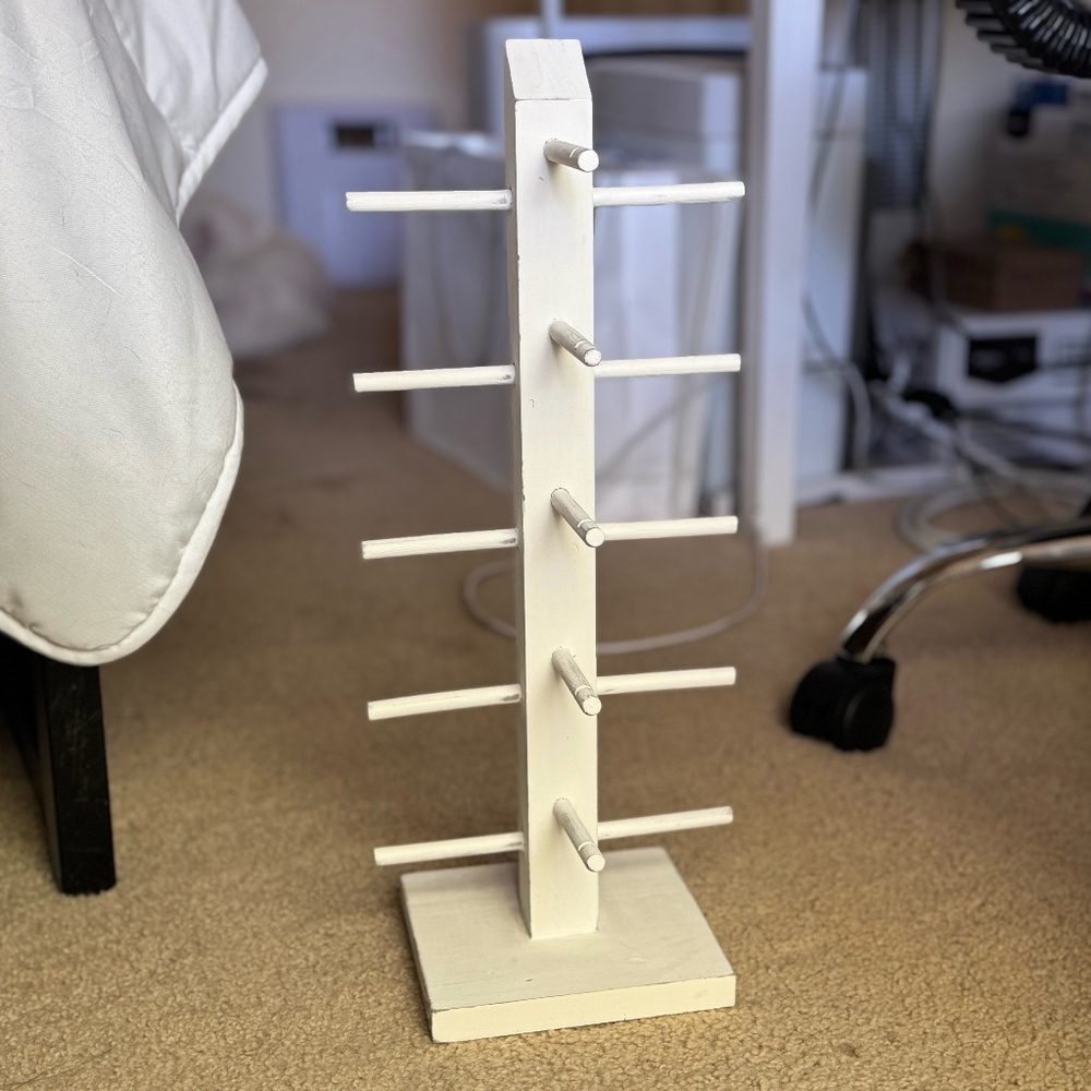 white wooden sunglass organizer and display stand